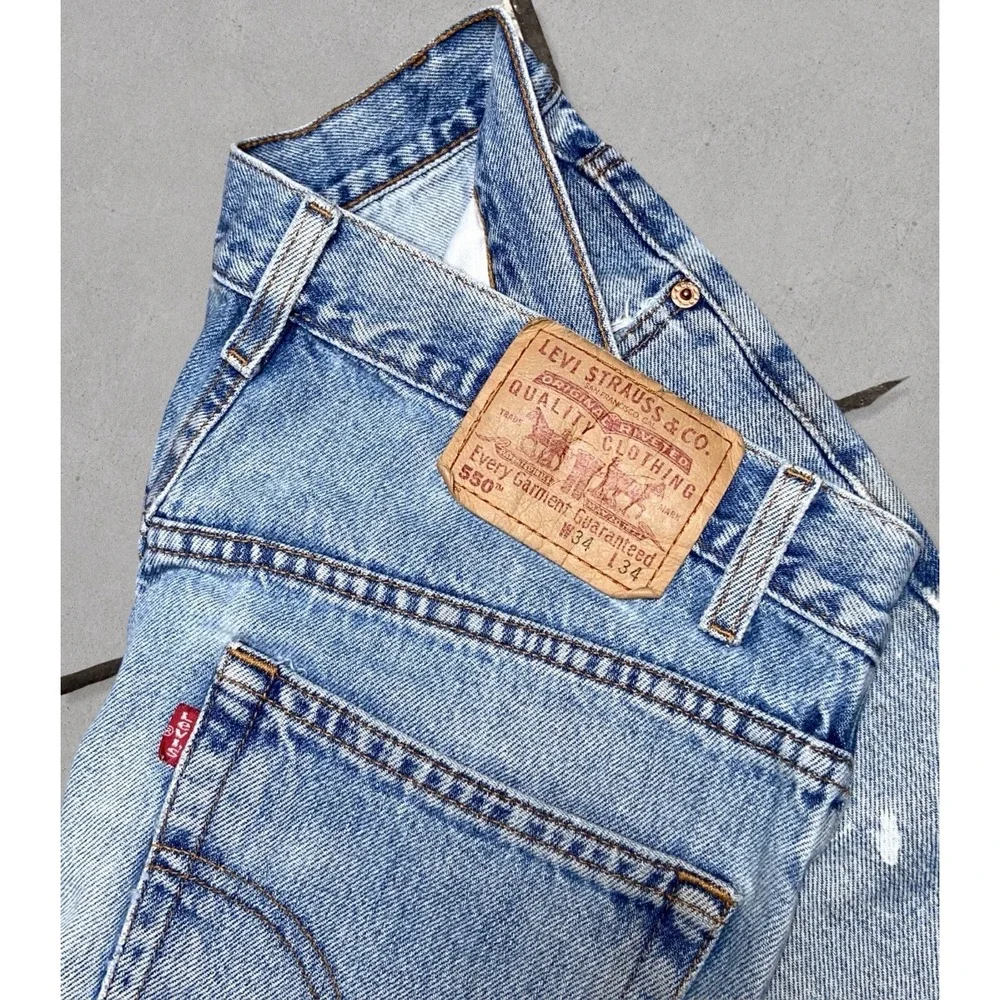 Vintage Levi's 550 Relaxed Fit Jeans Men's Size 34x34 (Fits 32x34) Blue Distress